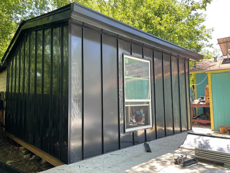 Black standing seam metal wall panels for Roof Inspection in Irvine